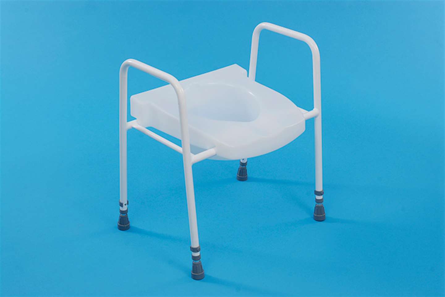 Toilet frame with raised seat